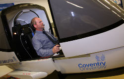 photograph - One man in a flight simulator