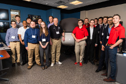 All teams with Gary Konnert in the University of Dayton simulation laboratory